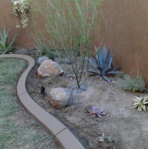 Colored angled concrete landscape curb