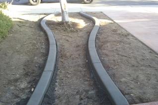 Sweeping curved concrete curb